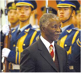 President Thabo Mbeki inspects a Chinese guard of honour during a state visit to China. 