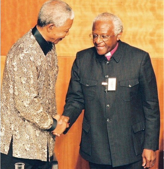 Former President Nelson Mandela with the chairperson of the Truth and Reconciliation Commission Archbishop Desmond Tutu.