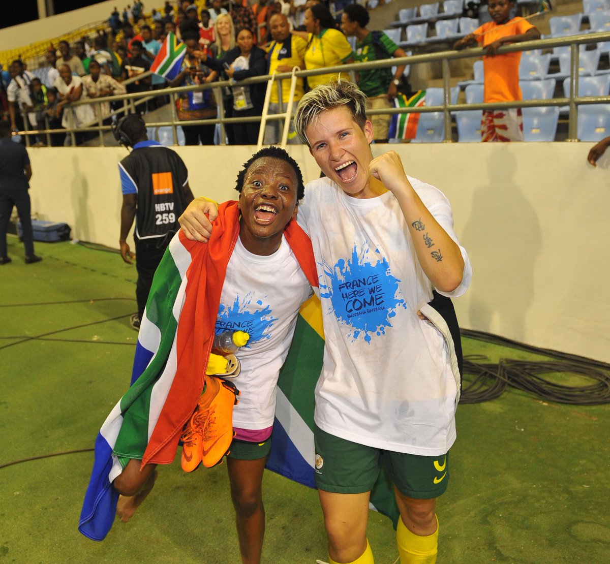 Banyana Banyana striker Thembi Kgatlana and Captain Janine van Wyk celebrate their win against Mali in the AWCON semi-final and qualifying for the FIFA Women’s World Cup in France next year.
