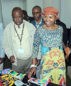 Minister of Small Business Development Lindiwe Zulu interacts with cooperatives at an exhibition held during International Cooperative Day.