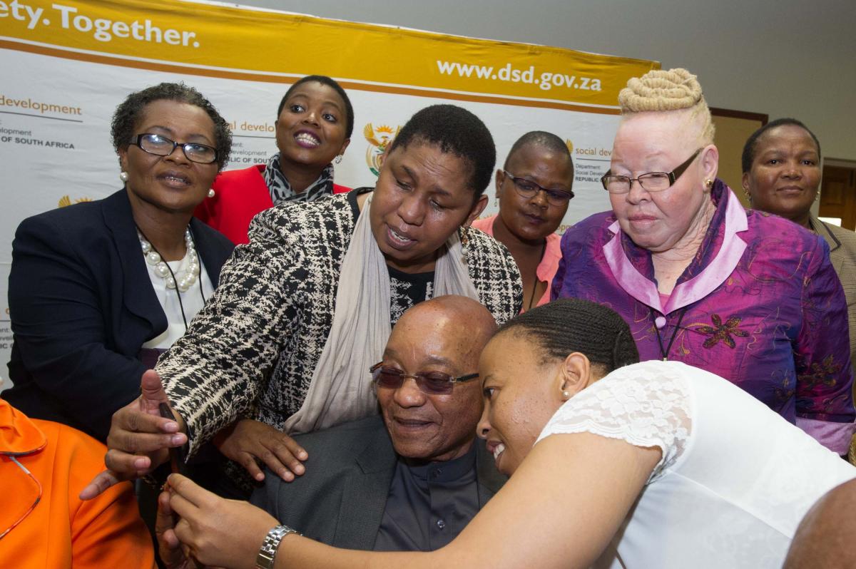 President Jacob Zuma and Social Development Deputy Minister Hendrietta Bogopane-Zulu (centre) interacting with delegates at the Presidential Working Group on Disability during Human Rights Month in March.