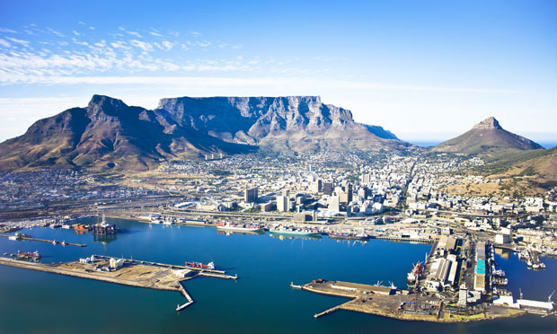 Aerial view of Cape Town city centre, with Table Mountain, Cape Town Harbour, Lion's Head and Devil's Peak.