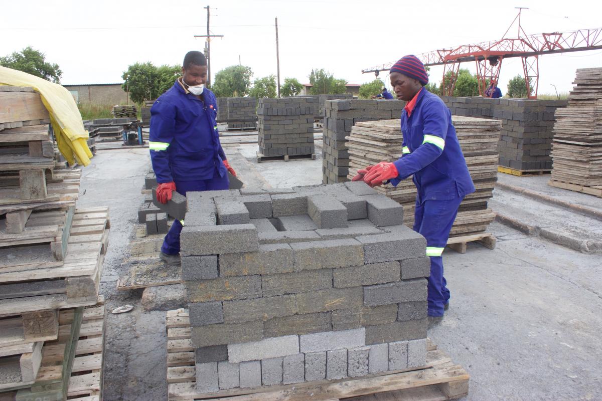 Workers at Mr Brick Factory in Secunda packing bricks to be delivered to local suppliers