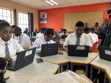 Pupils of Soshanguve East Secondary School getting a feel of the new study tool during the launch of the Digital Content and Online Assessment Platform.
