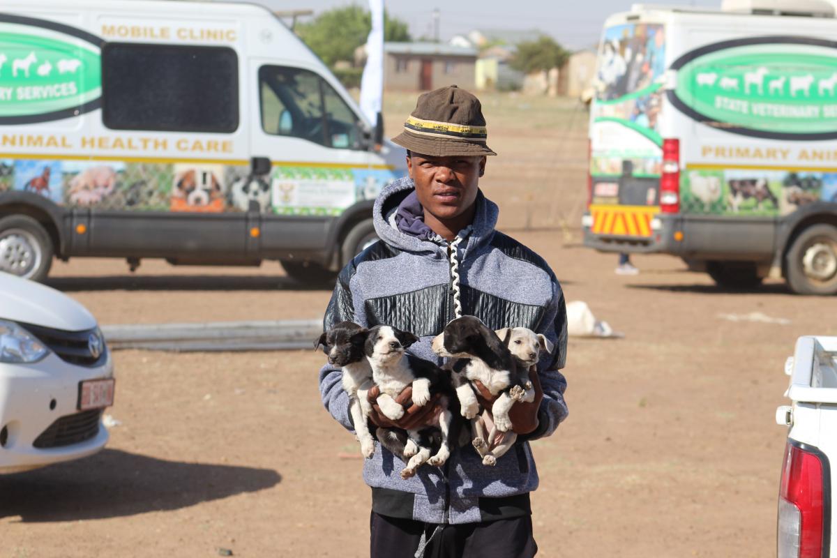 One of the community members from Ottosdall who had just vaccinated his puppies.