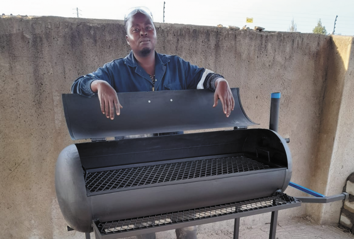 Matome Maphala ready to sell his innovative braai stands.