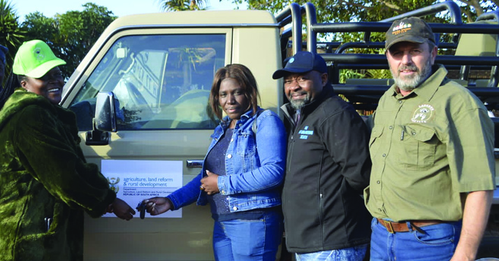 Vuyiswa Skoen and Monde Mpumela from MAFU receive vehicle keys from the Chief Financial Officer of the National Department of Agriculture, Land Reform and Rural Development Rendani Sadiki. They are accompanied by Nico Lerm from the Lerm Trust on the far right.