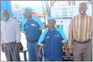Site Manager Victor Maluleke, petrol attendants Sipho Gwatuli and Rosemary Thagwana and Secretary Ronald Rasimbi take pride in the work they do at the Mutale Integrated Energy Centre.