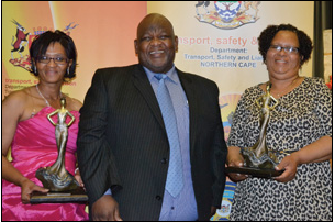 Lina Simboyia (left) and Tanya Anders scooped the top spots in the Northern Cape Women in Transport Awards, recently. Transport MEC Mac Jack presented Simboyia with the award in the Women Entrepreneurs in the Transport Industry category and Anders with the award in the Women with Best Outstanding Law Enforcement Role category.
