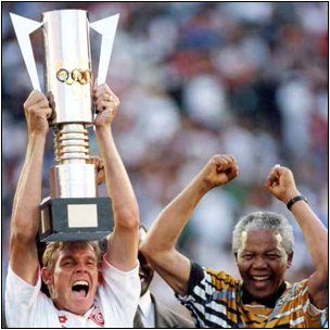 The late former President Nelson Mandela celebrates with the then captain Bafana Bafana Neil Tovey after South Africa won the 1996 African Cup of Nations.
