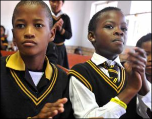 Grade 4 learners from the Gonyane Primary School in Mangaung celebrate during the launch of the HPV vaccination campaign at their school.