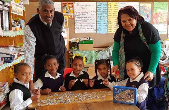 Learners of the Kretzenhoop Primary School enjoy building the 120-piece GO GEORGE puzzle.