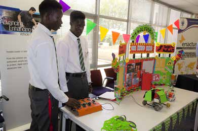 Trevor Simelane and Joseph Mdluli with their award-winning fire rescue robot.