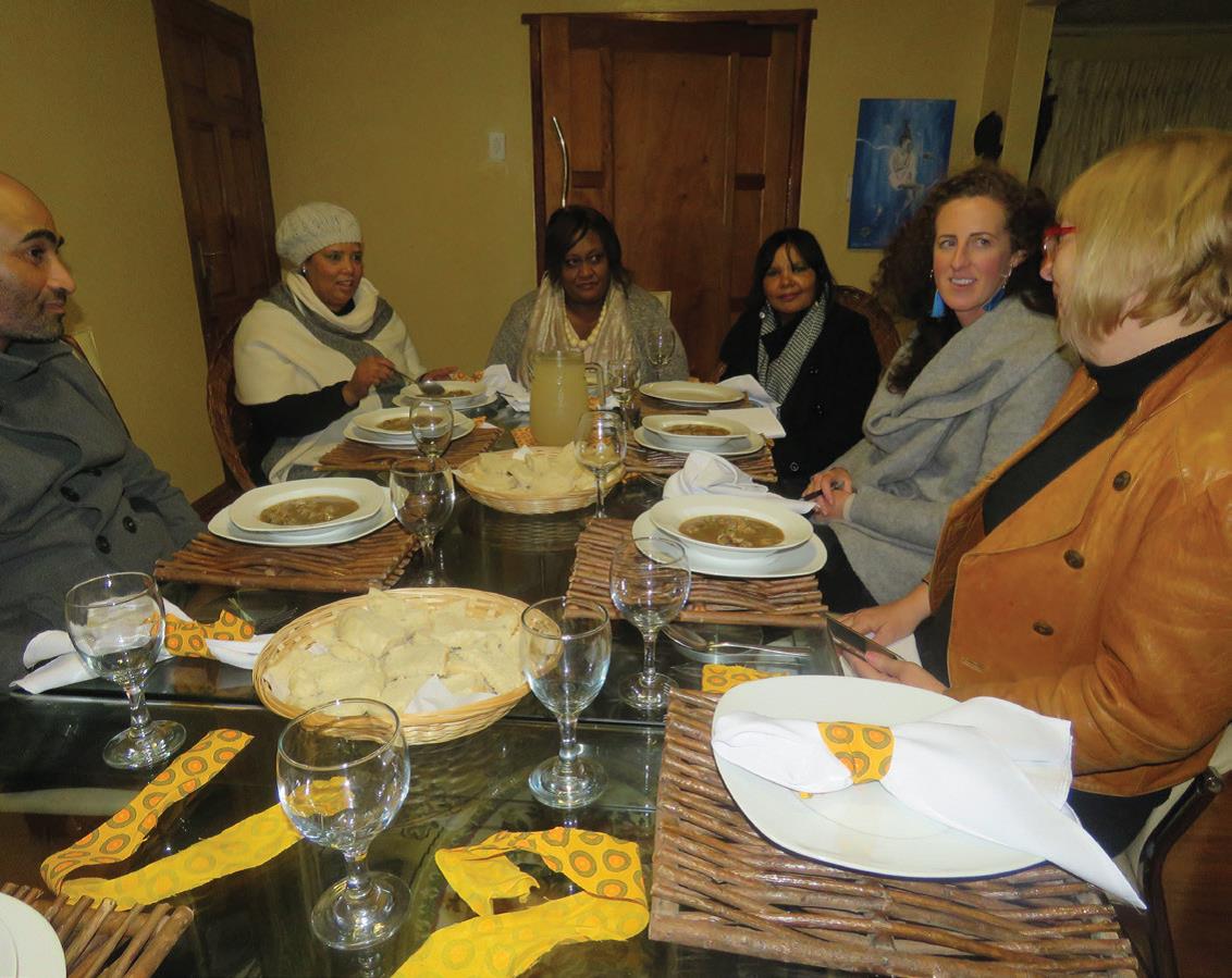 Guests enjoy a test dinner hosted by the Explore our Hood Team in Thembalethu as part of the Dining with Locals initiative.