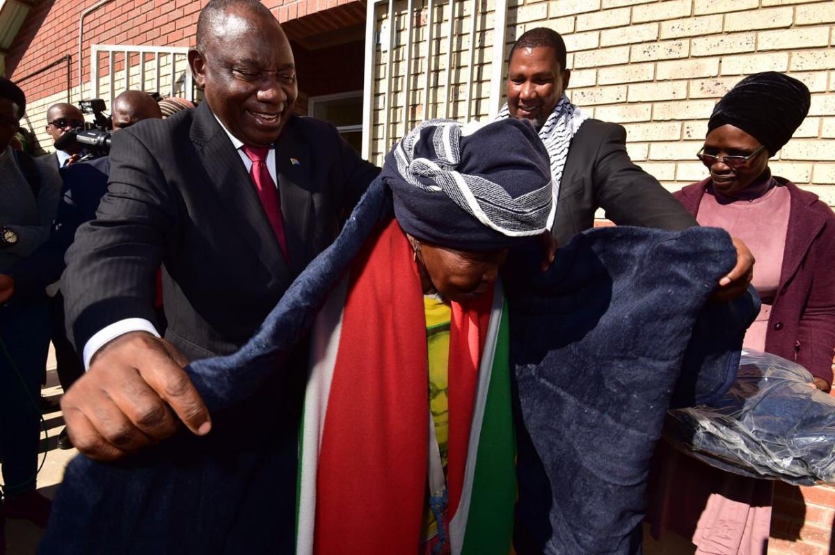 President Ramaphosa handing over blankets to elderly citizens as part of the Nelson Rolihlahla Mandela Centenary Celebrations at Mvezo Komkhulu, Mthatha in the Eastern Cape