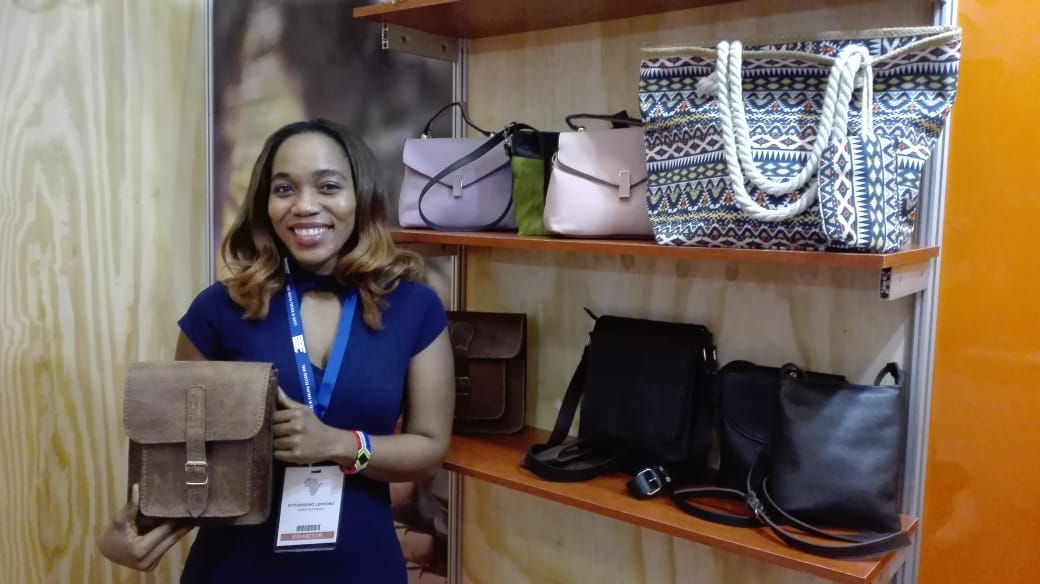 Textile designer and businesswoman Nthabi Lephoko with one of the leather bags she designed. Lephoko owns Leratolethato, a leather design and manufacturing company based in Cape Town.