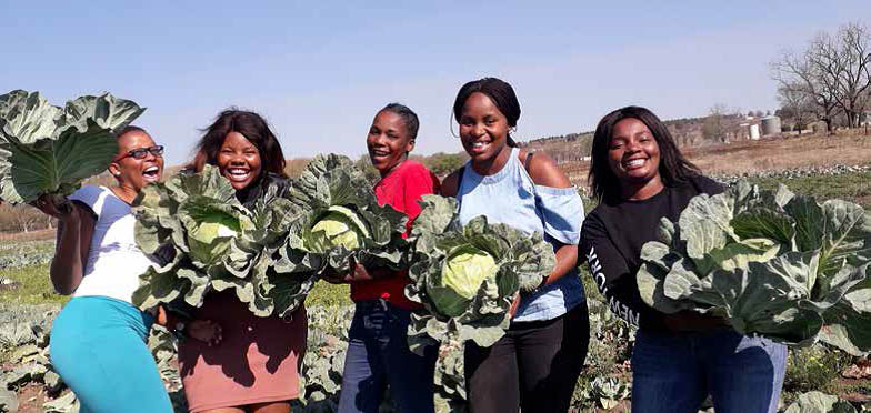 Nyamvubu cooperative members work hand-in-hand to make their farming business a success.