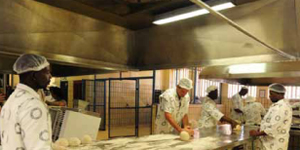 Baking bread is the order of the day at the Boksburg Correctional Centre’s workshop where offenders are acquiring skills in baking, welding, woodwork, upholstery and textiles.