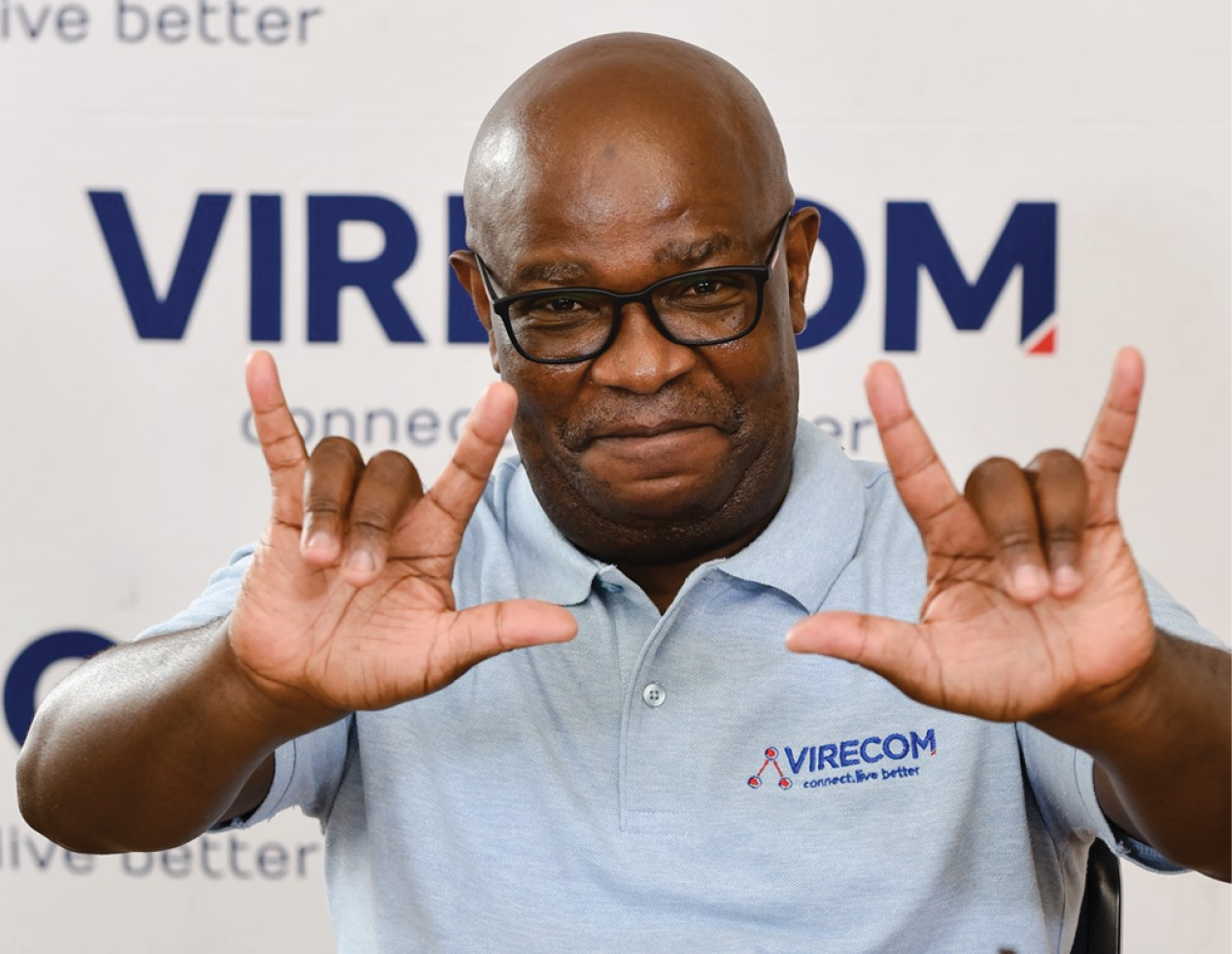 Jabulane Blose, founder of Virecom, signing 'I Love You’ which is a powerful symbol of love, unity and belonging. Although sign languages differ across countries, this one is universally recognised among Deaf people, communicating not only affection, but also pride in the shared Deaf identity.