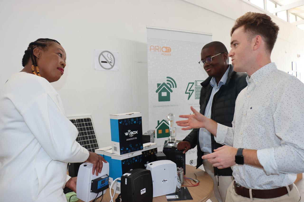 Minister of Small Business Development Stella Ndabeni-Abrahams with owners of Arion Power Brian Gadisi and Alan Gie.