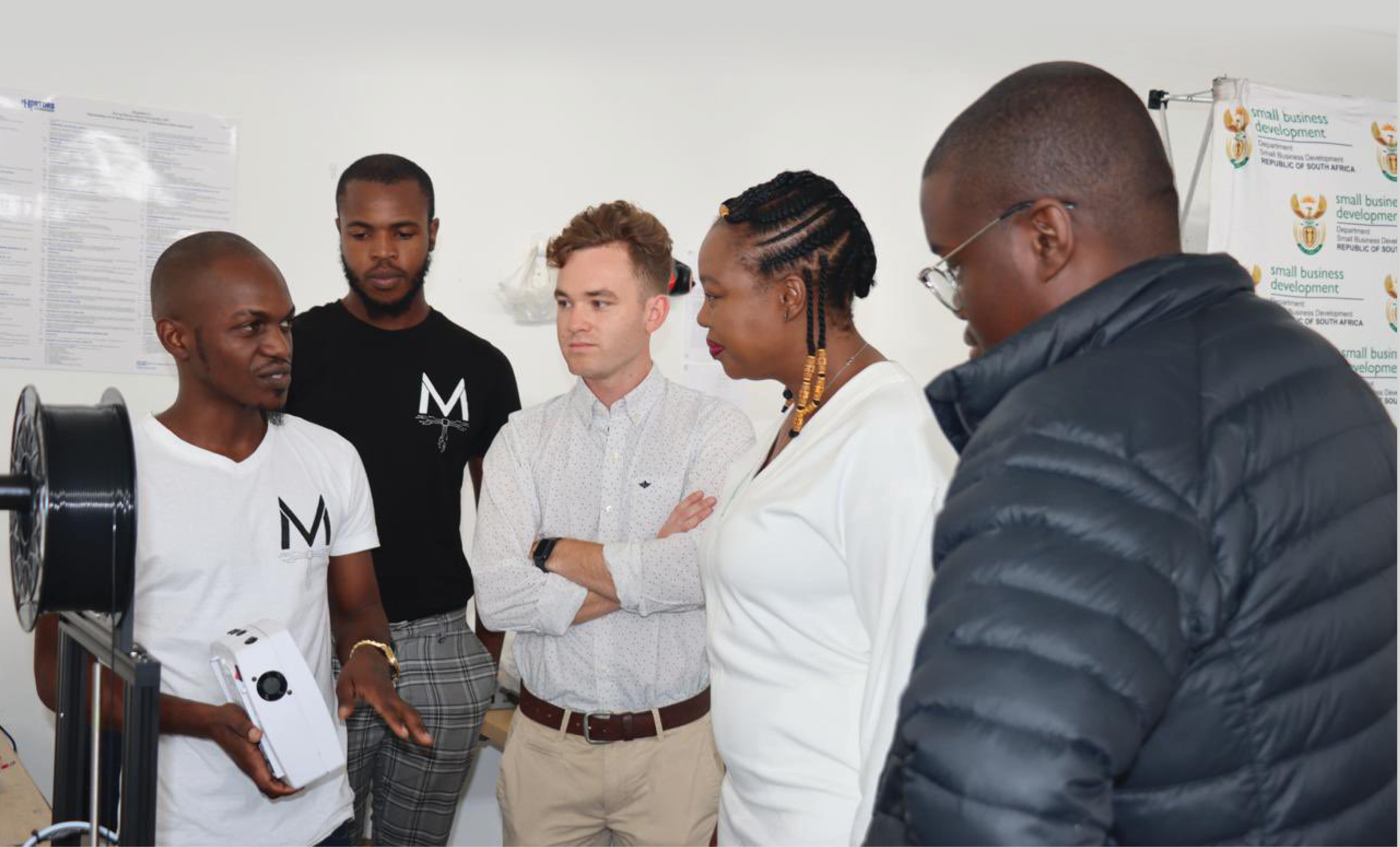 Arion Power management engage Small Business Development Minister Stella Ndabeni during her visit to the company’s factory in Capricorn Muizenberg.