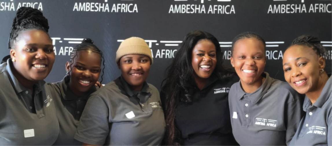 Trudy Windy Mkansi (in black) pictured with her team at Ambesha Africa.