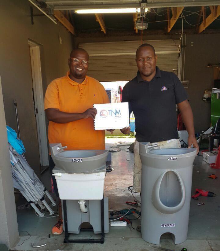 Rori Mpete (left) and Thoriso Thobejane with the Loo Cap and the Pee Basin.