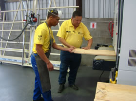 Employees of the Eco Furniture Factory, which is part of the SANParks Natural Resource Management Programme. [Photo: Courtesy Department of Environmental Affairs] 