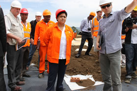 Former MEC Maggie Govender on the roof of the new "green" building with Architect Steve Kinsler and project managers.