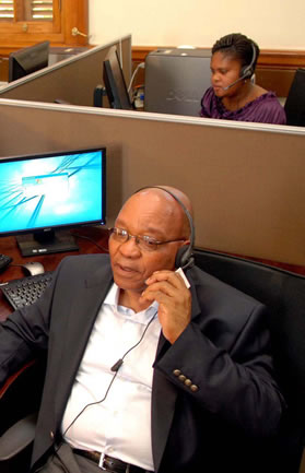 President Jacob Zuma takes a call at the Presidential Hotline call centre.