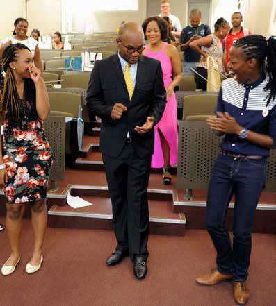 Arts and Culture Minister Nathi Mthethwa learns a few dance moves from the choreographer and actress of the movie Hear Me Move.