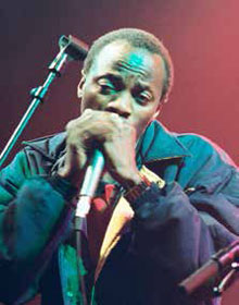 The late Minister Collins Chabane plays the harmonica at one of the many music festivals he participated in.