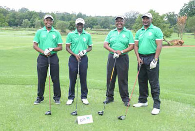 Freeman Nomvalo, the late Minister Collins Chabane, Thabiso Magodielo and Andrew Nongogo at the GCIS Golf Day in 2013.