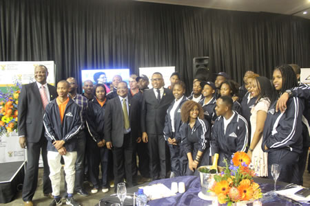 Deputy Minister of Higher Education and Training Mduduzi Manana (centre) with the 25 young designers who are in Italy and Switerland studying jewellery making.