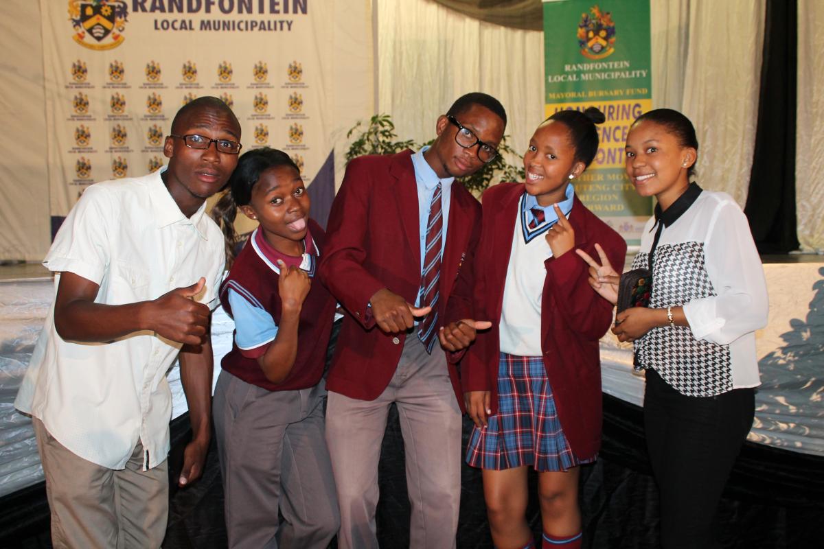 The Randfontein Municipality has helped Sithelosethu Sigwela (centre) realise his dream of studying further.