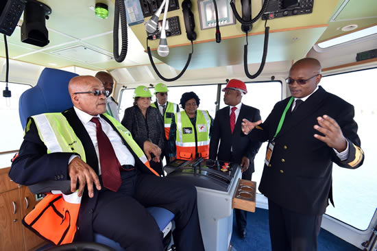 President Jacob Zuma on board a boat at the Port of Port Elizabeth. He is seen here with Minister Lynne Brown, Premier Phumulo Masualle and Mayor Danny Jordaan.