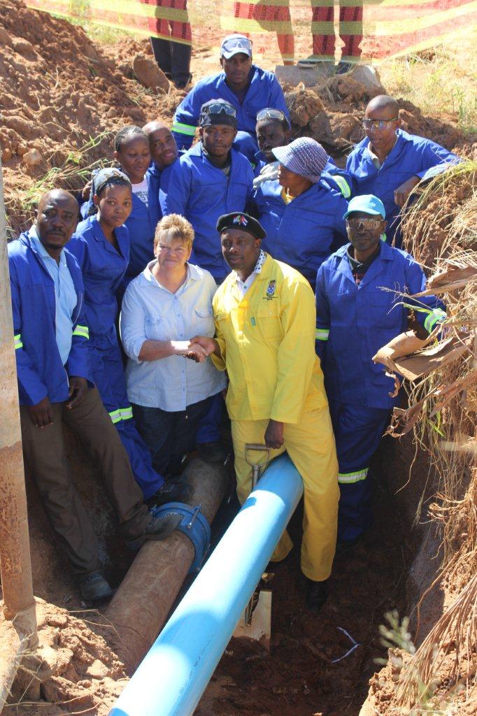 Lephalale Mayor Jack Maeko (middle) inspecting new asbestos pipes. Residents of Lephalale Municipality will enjoy better quality water because of the infrastructure upgrade. upgrade.