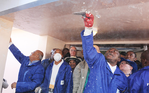 Deputy President Cyril Ramaphosa with Premier Supra Mahupeloa and Minister Pravin Gordhan leading the cleaning campaign in Mafikeng Hospital, in the North West Province during the previous Nelson Mandela International Day activities.