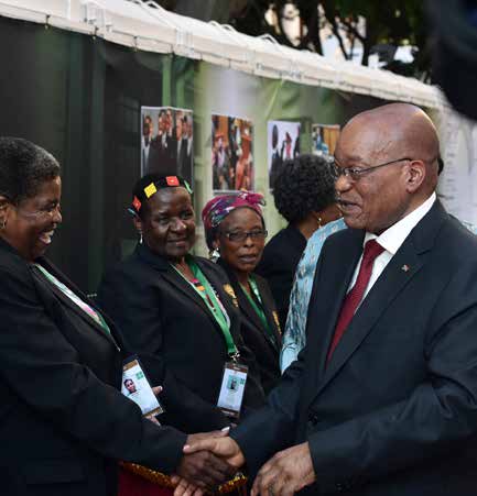 President Zuma meets guests outside of Parliament.