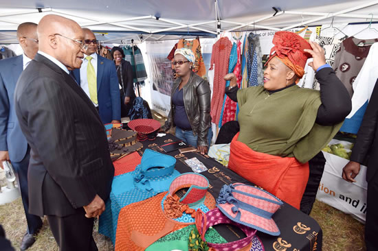 President Jacob Zuma chats with entrepreneurs who have set up shop at the new Maluti-A-Phofung Special Economic Zone outside Harrismith in the Free State