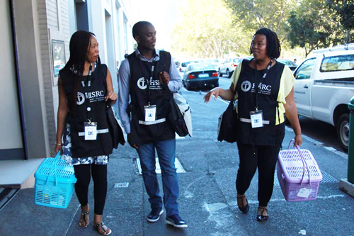 Human Sciences Research Council field workers visiting communities can be identified by their HSRC bibs. (Image: HSRC)