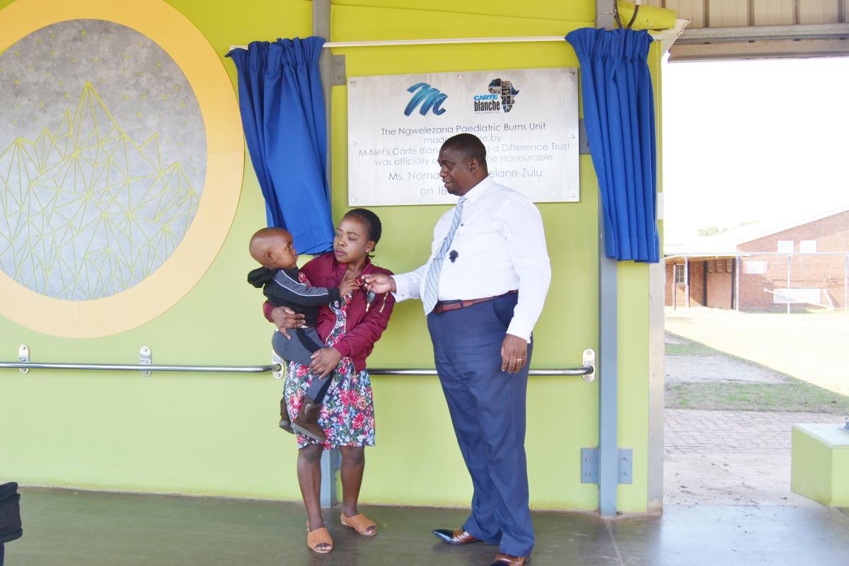 From left to right: Two-year-old Lubanzi Luthuli with her mother Sinenhlahla Mlondi and the CEO of Ngwelezana Hospital, Dr Bright Madlala at the newly opened Paediatric Burns Unit