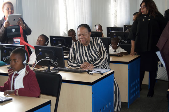 Minister of Science and Technology Naledi Pandor in the Sigidisabathembu Primary School computer lab, as learners get to use the new equipment for the first time.