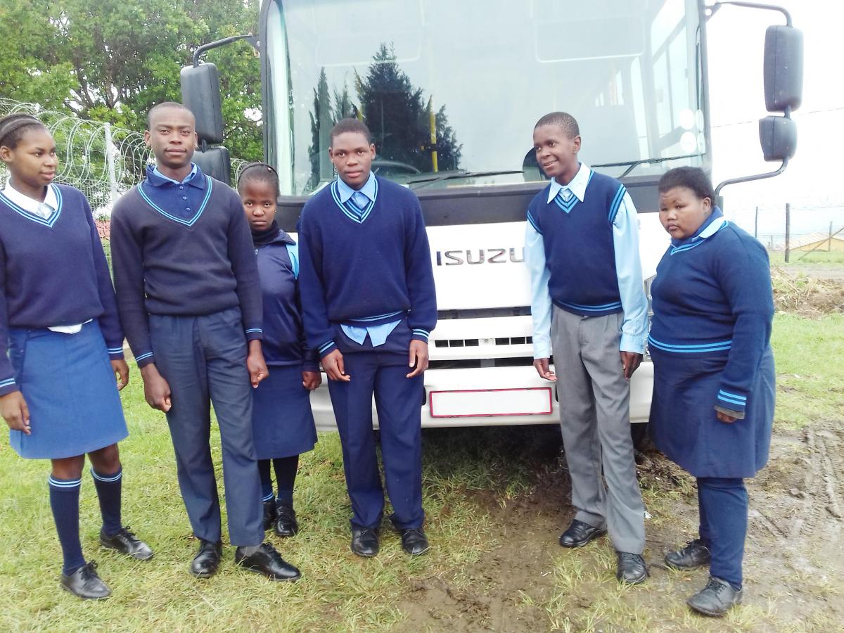 Minenhle Bhengu (far right) with some of the learners that benefited from the KZN special schools bus programme.