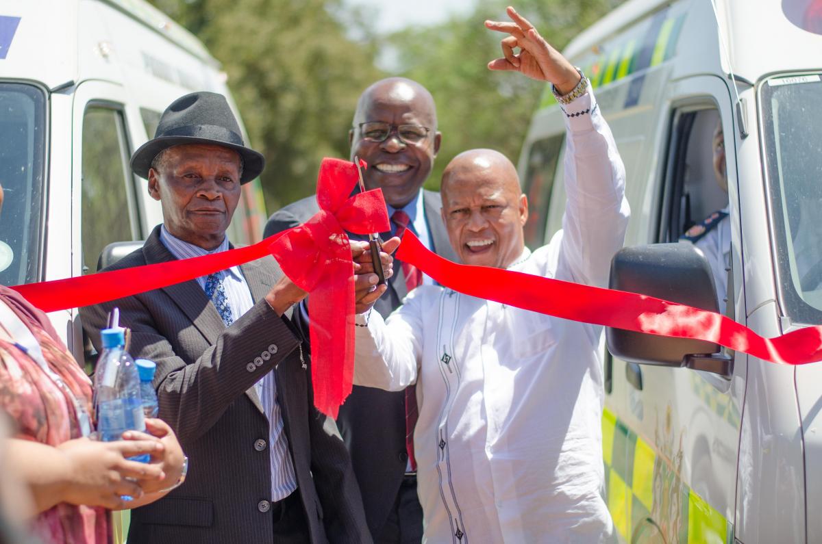 From left Bapo Ba Mogale Representative Rangwane Radikobonyana Mogale, CEO of Lonmin Ben Magara and North West MEC of Health Honourable Magome Masike at the handover ceremony of ambulances. Photo Cred: Jerri Mokgofe