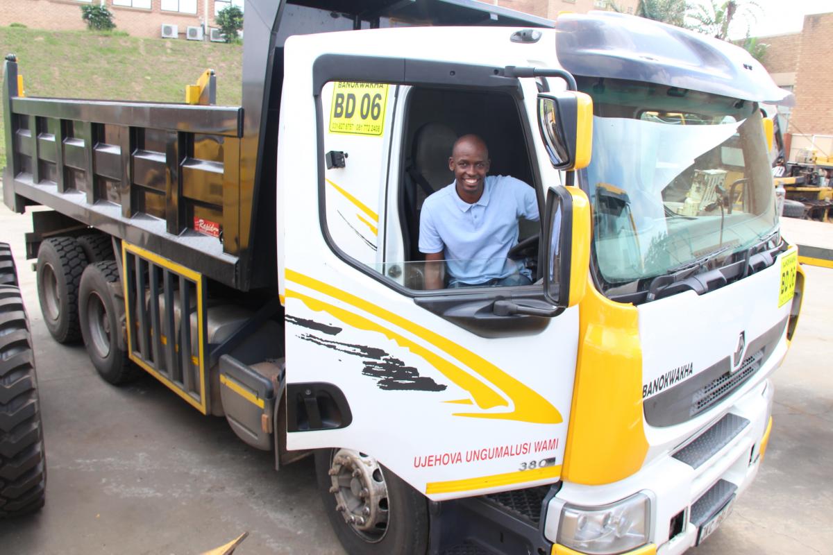 Sandile Ntuli test driving one of his trucks at their office in Pinetown, west of Durban.