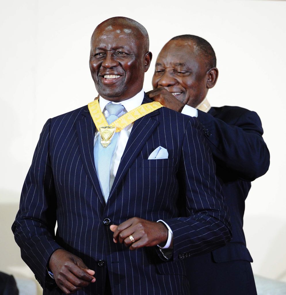 President Cyril Ramaphosa bestowing Justice Dikgang Moseneke with the Order of Luthuli in Gold.