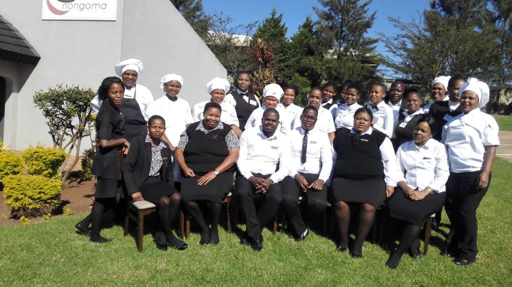 Mlungisi Nzuza with his workers.