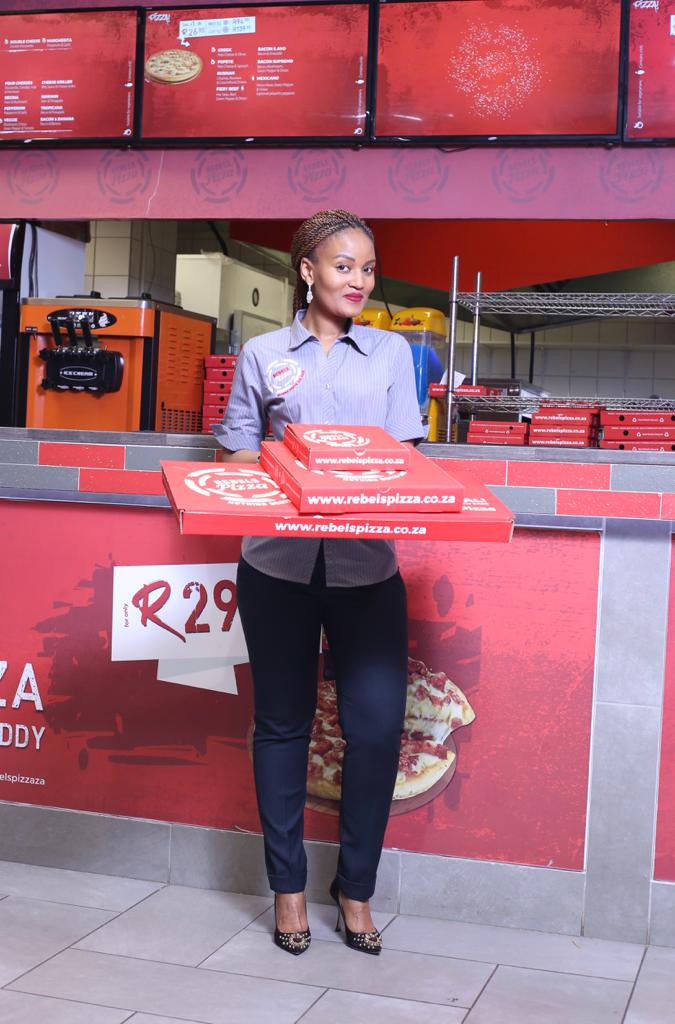 Florence Ndlovu living her life to the fullest as an entrepreneur in the pizza industry.