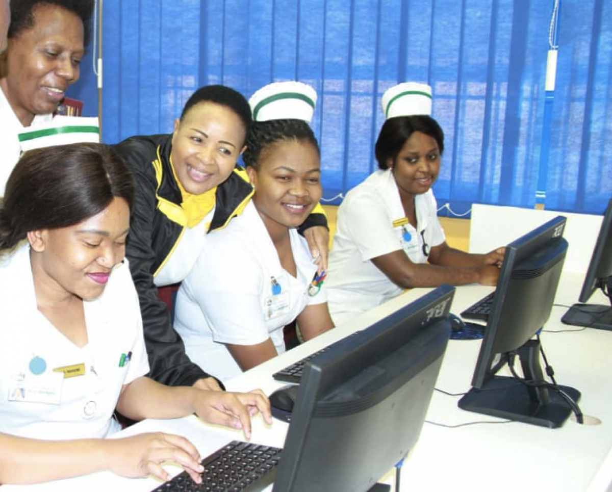 Student nurses test driving computers donated by MTN.